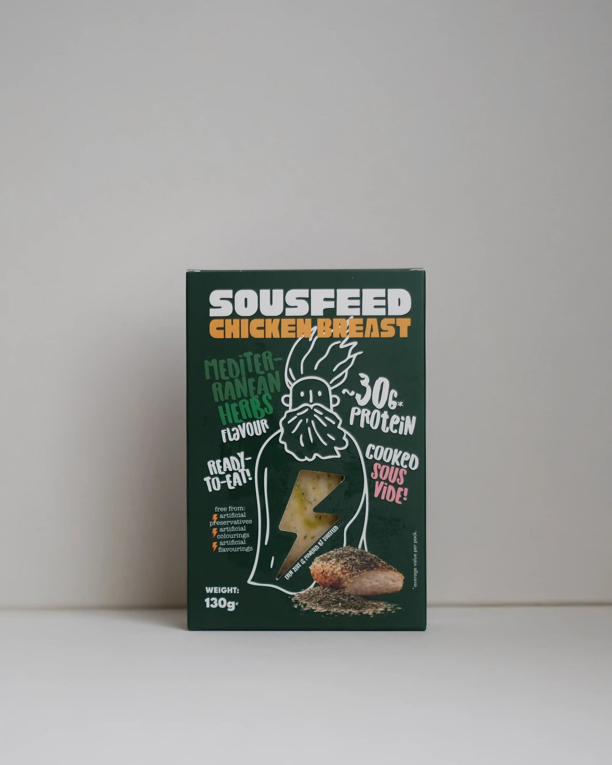 Front view of a SousFeed mediterranean herbs flavoured chicken breast and its packaging on a white background