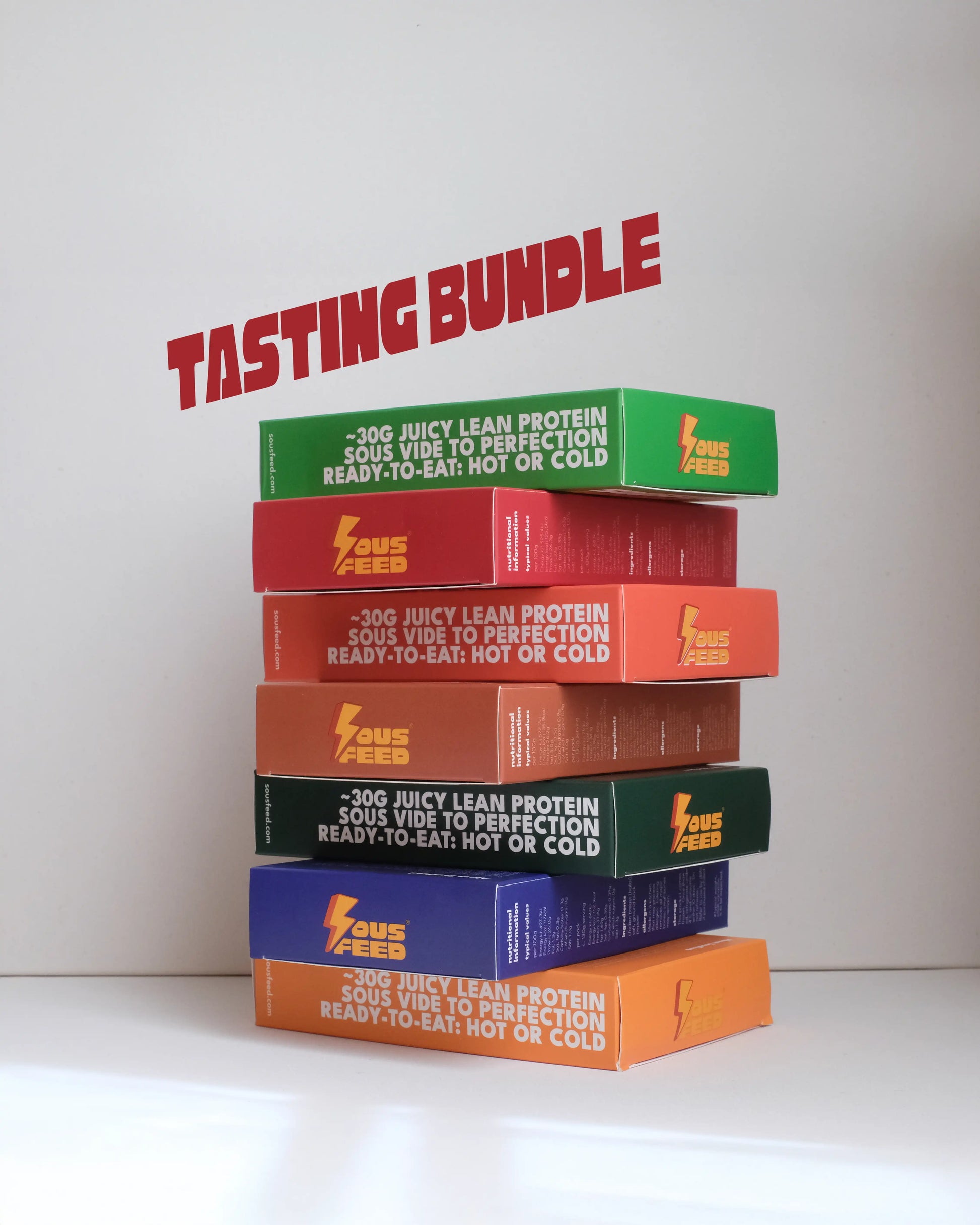 Stack of boxes of SousFeed products with 'Tasting Bundle' text on a white background