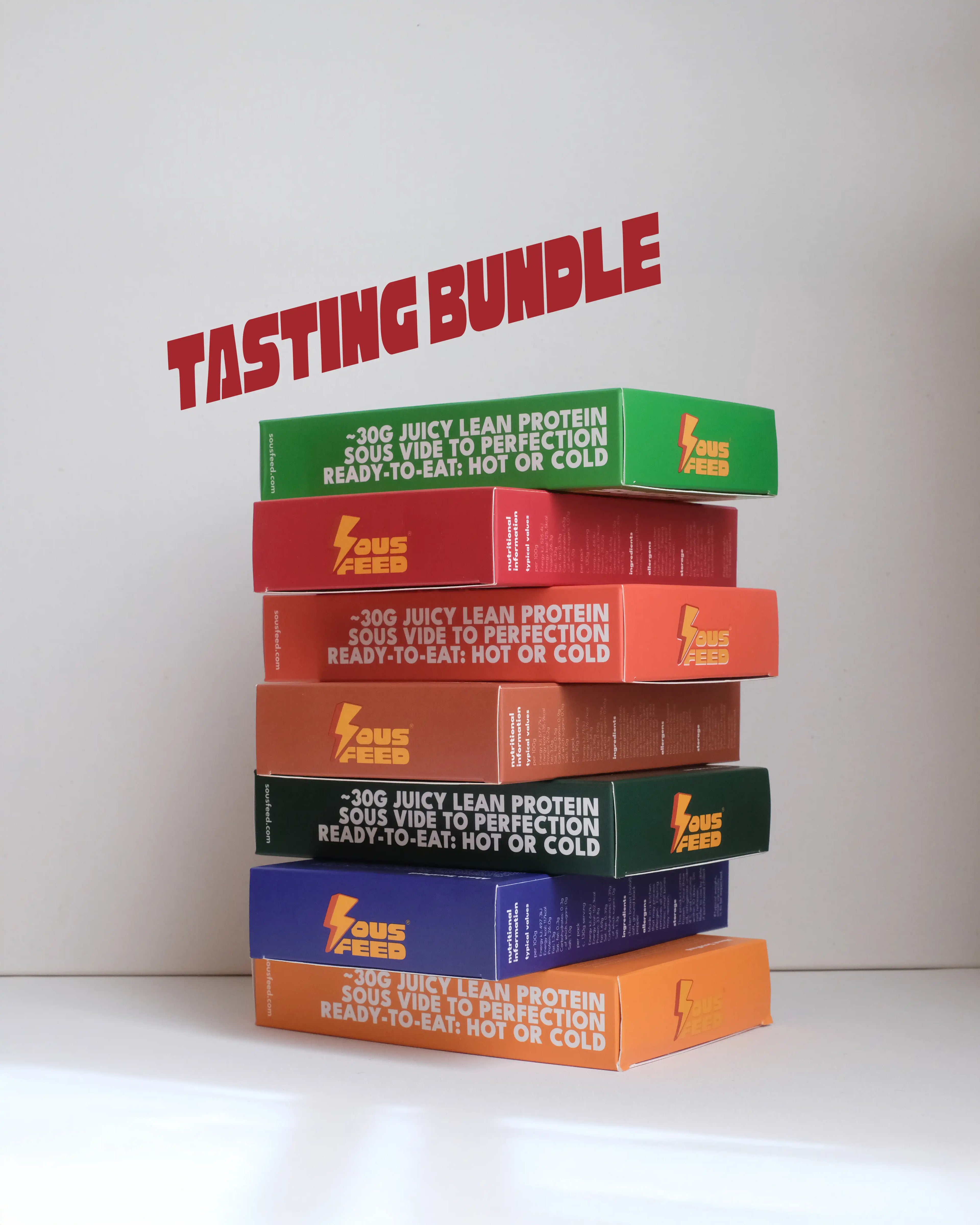 Stack of boxes of SousFeed products with 'Tasting Bundle' text on a white background