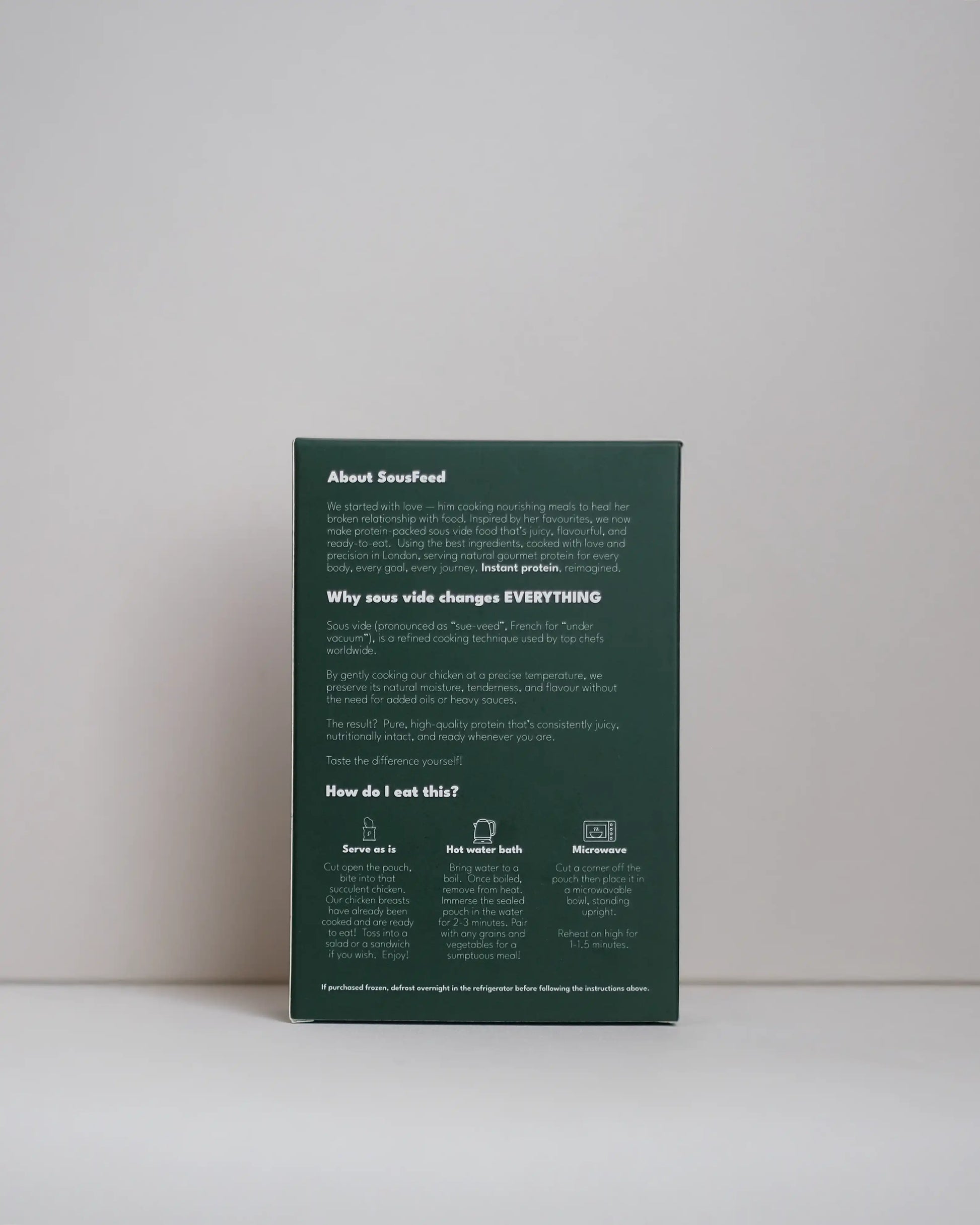 Back view of a SousFeed mediterranean herbs flavoured chicken breast and its packaging on a white background